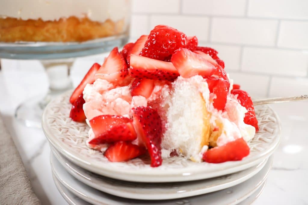 plate of angel food cake with strawberries