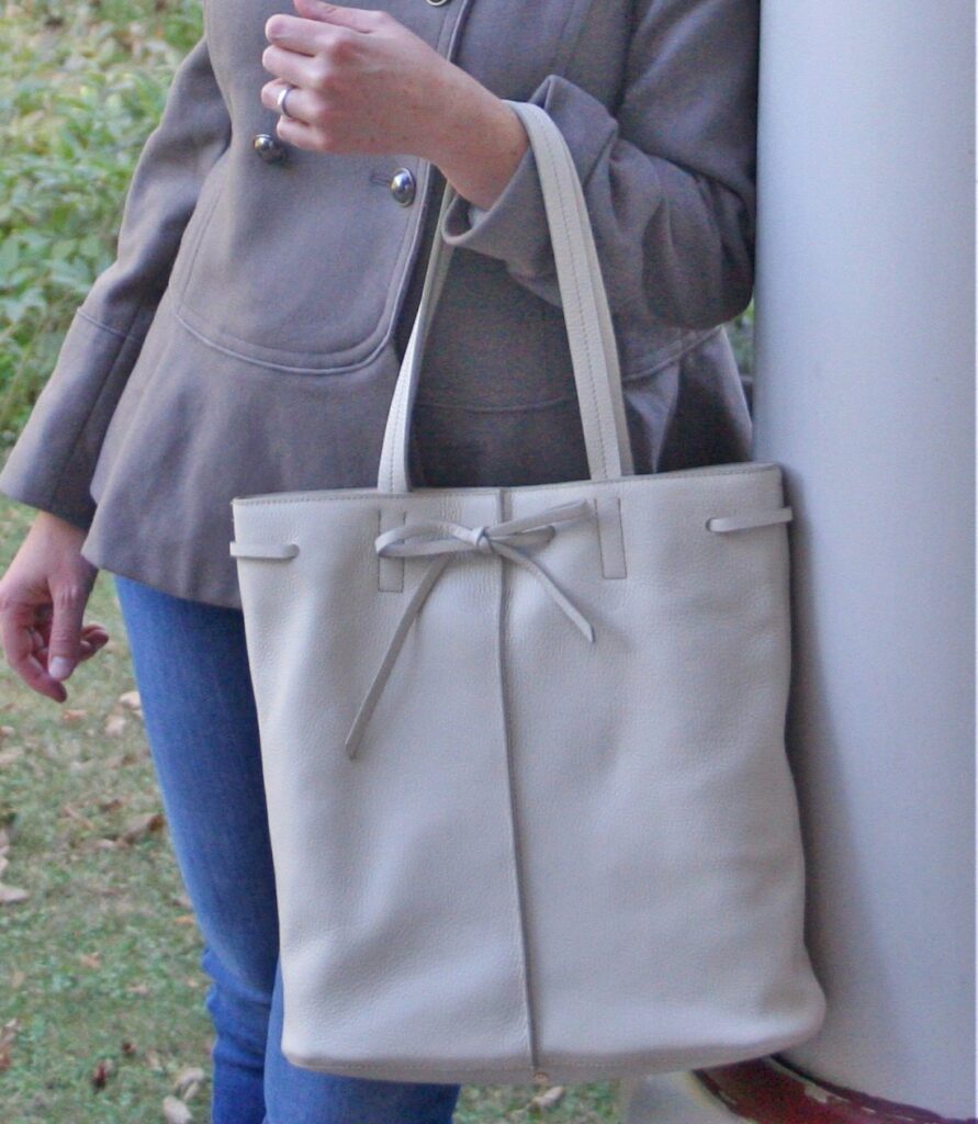 Peplum-Hem Italian Wool-Blend Coat and Rechargeable Leather Tote