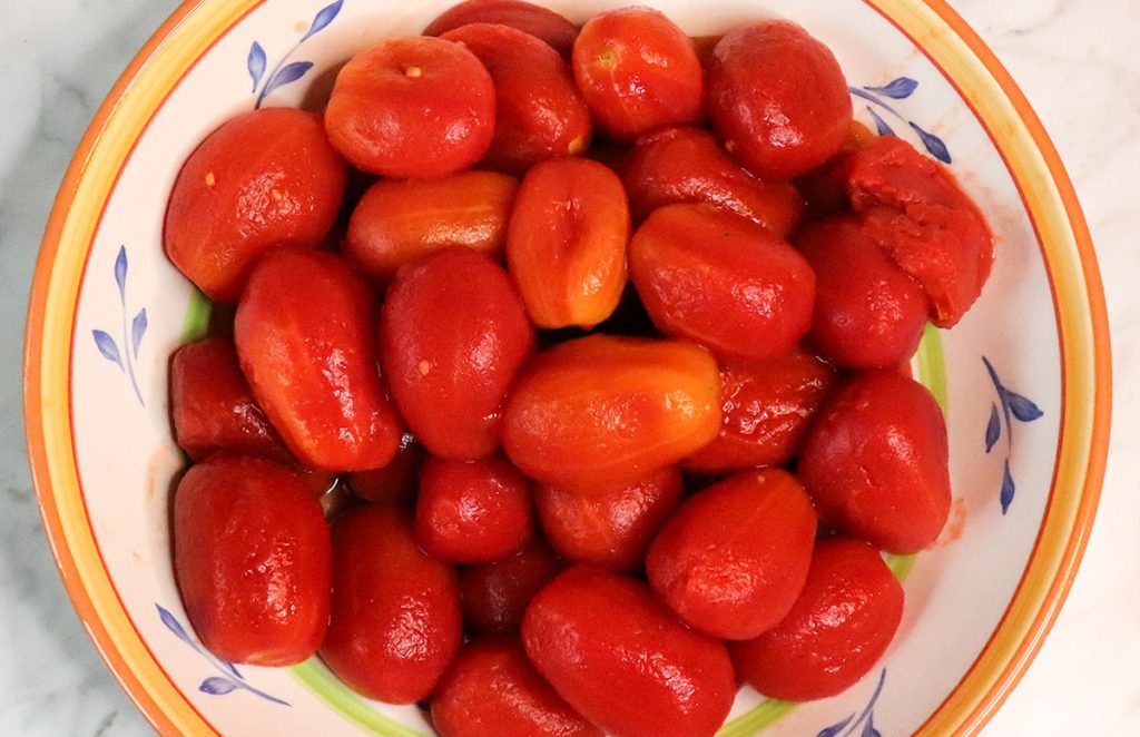 peeled tomatoes in a bowl