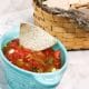 bowl of authentic Mexican salsa with tortilla chip