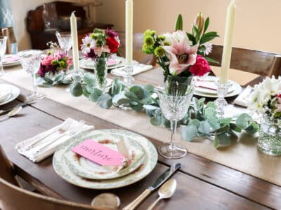 Mother's Day Table Decor Ideas final place setting with china, silverware, flowers and candles.