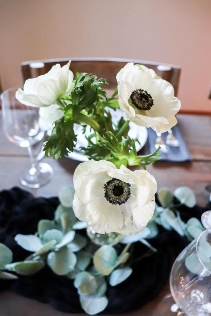 Panda anemone flowers in a bud vase.