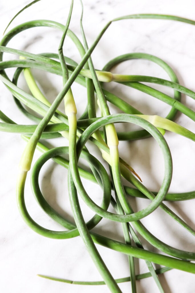 Garlic scapes on a counter.